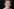 Bundesfamilienministerin Franziska Giffey vor dunklem Hintergrund