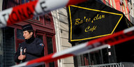 Vor dem Schild "Bataclan Café" steht eine Polizeisperre