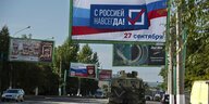 „Vereint mit Russland für immer, 27. September“ steht auf einem Banner in Luhansk